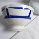 Vintage ironstone bowl from the Badonviller factory in cream and blue.