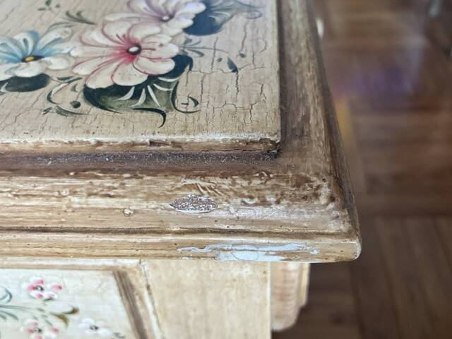 exotic wood console with a drawer