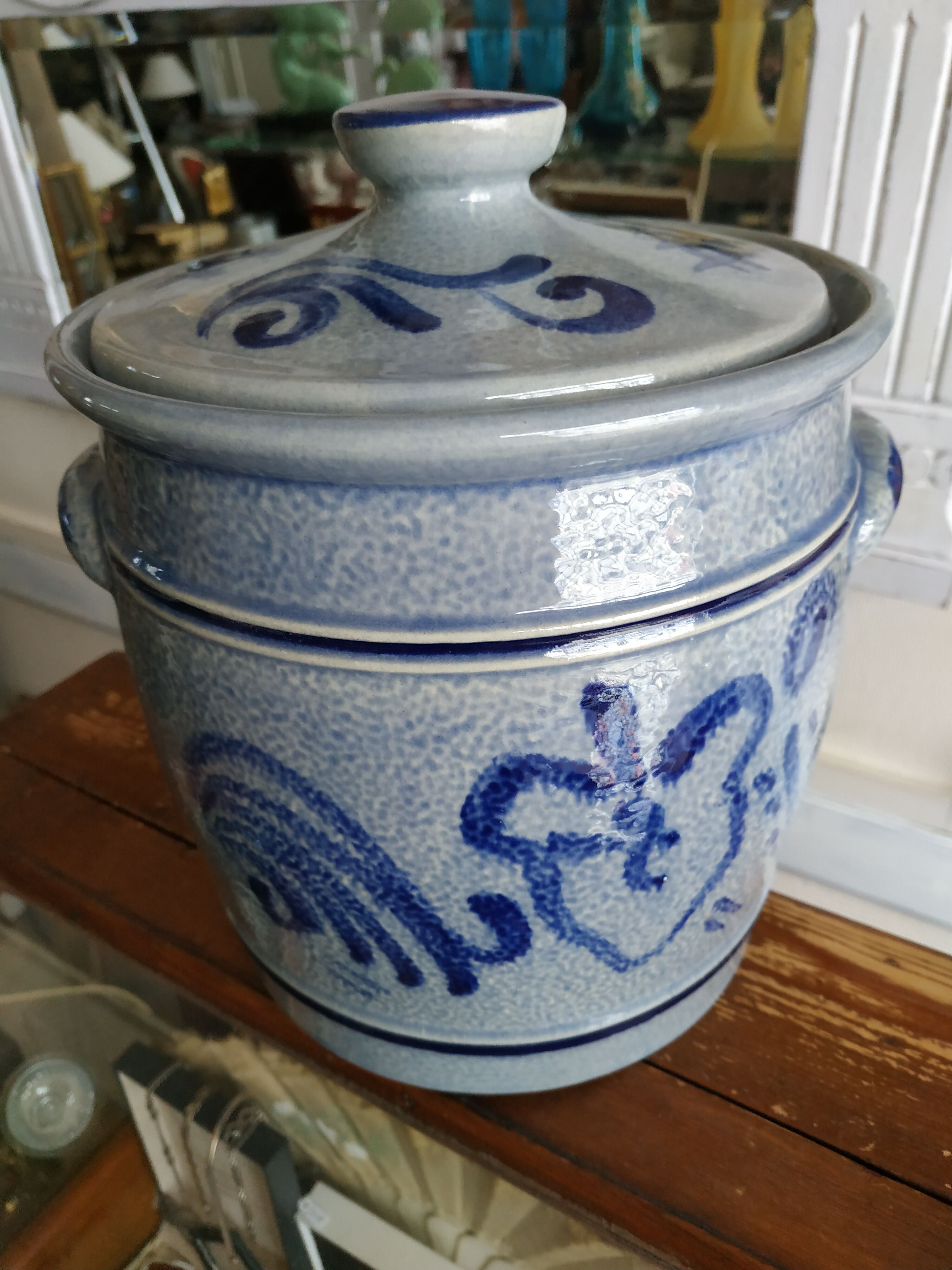 Covered sandstone pot