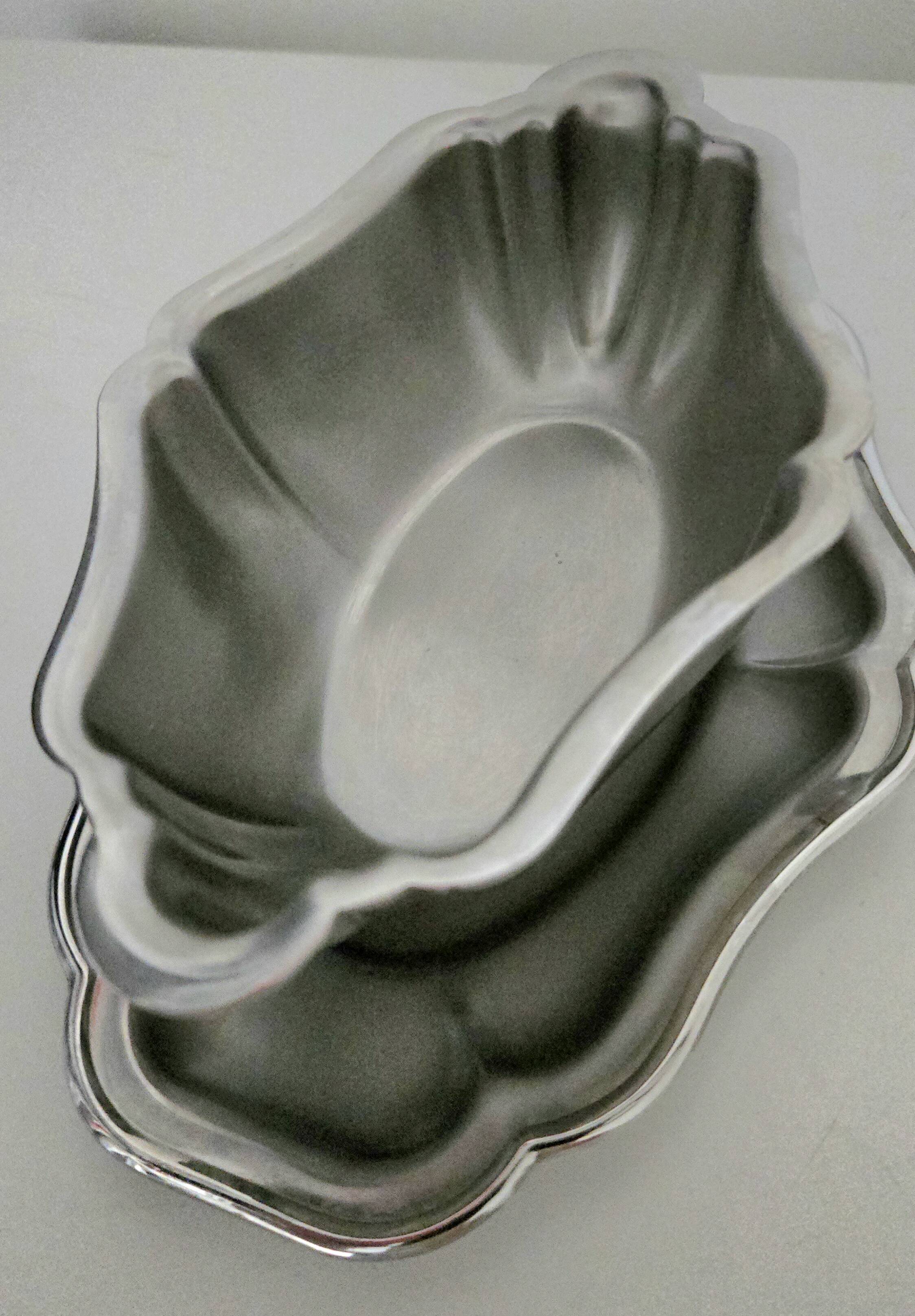 Patinated stainless steel sauceboat