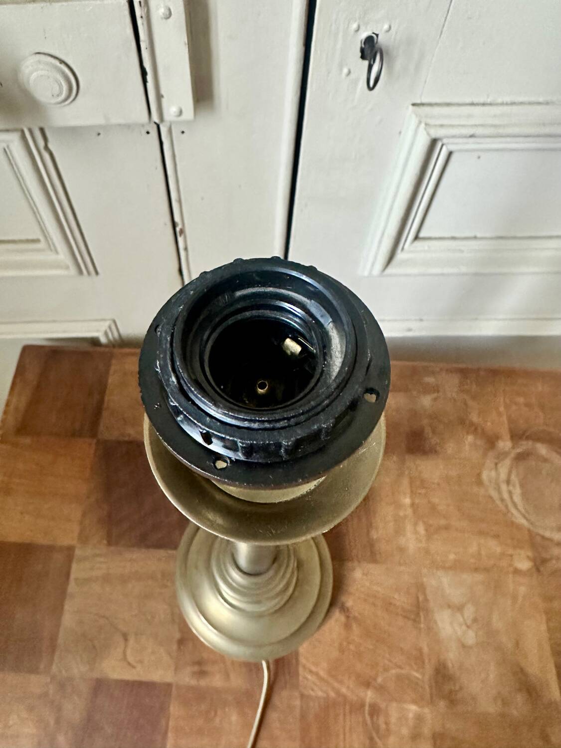 Lamp base in brass and chrome-plated steel