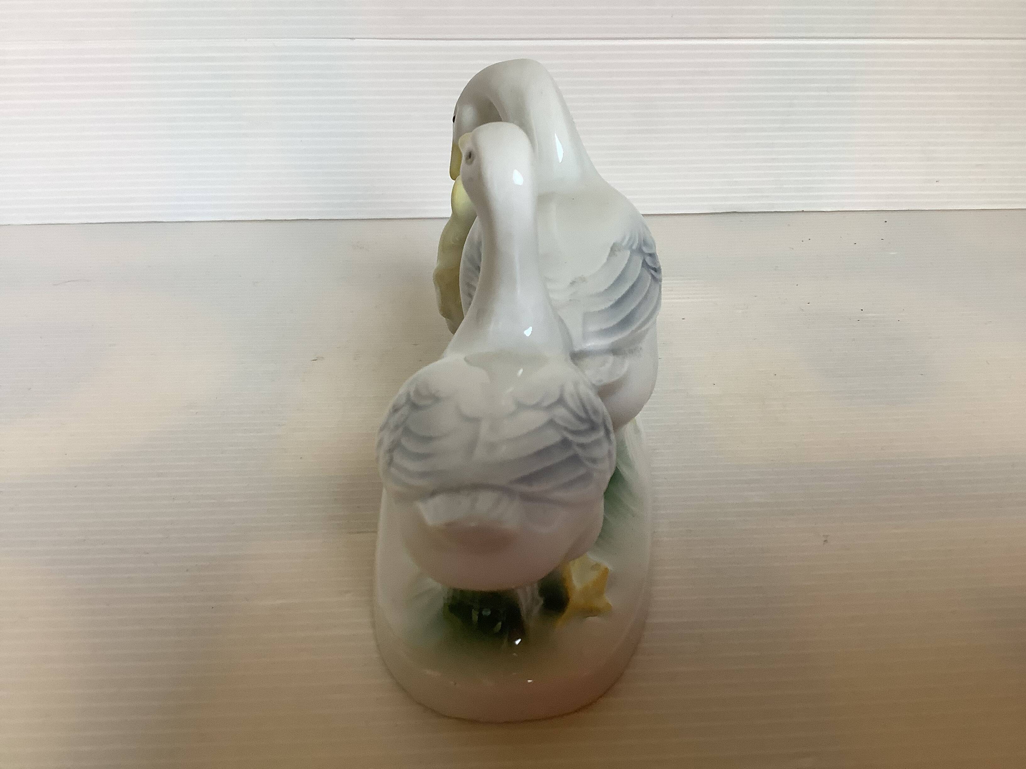 Trio of ceramic geese
