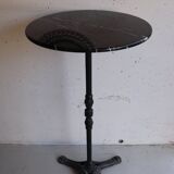 Antique bistro pedestal table in cast iron and veined black marble