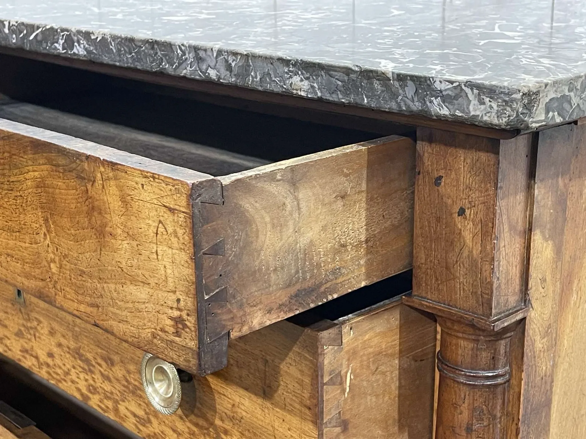 19th-century Empire commode in walnut with a grey St Anne marble top.
