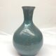 Light blue speckled ceramic vase