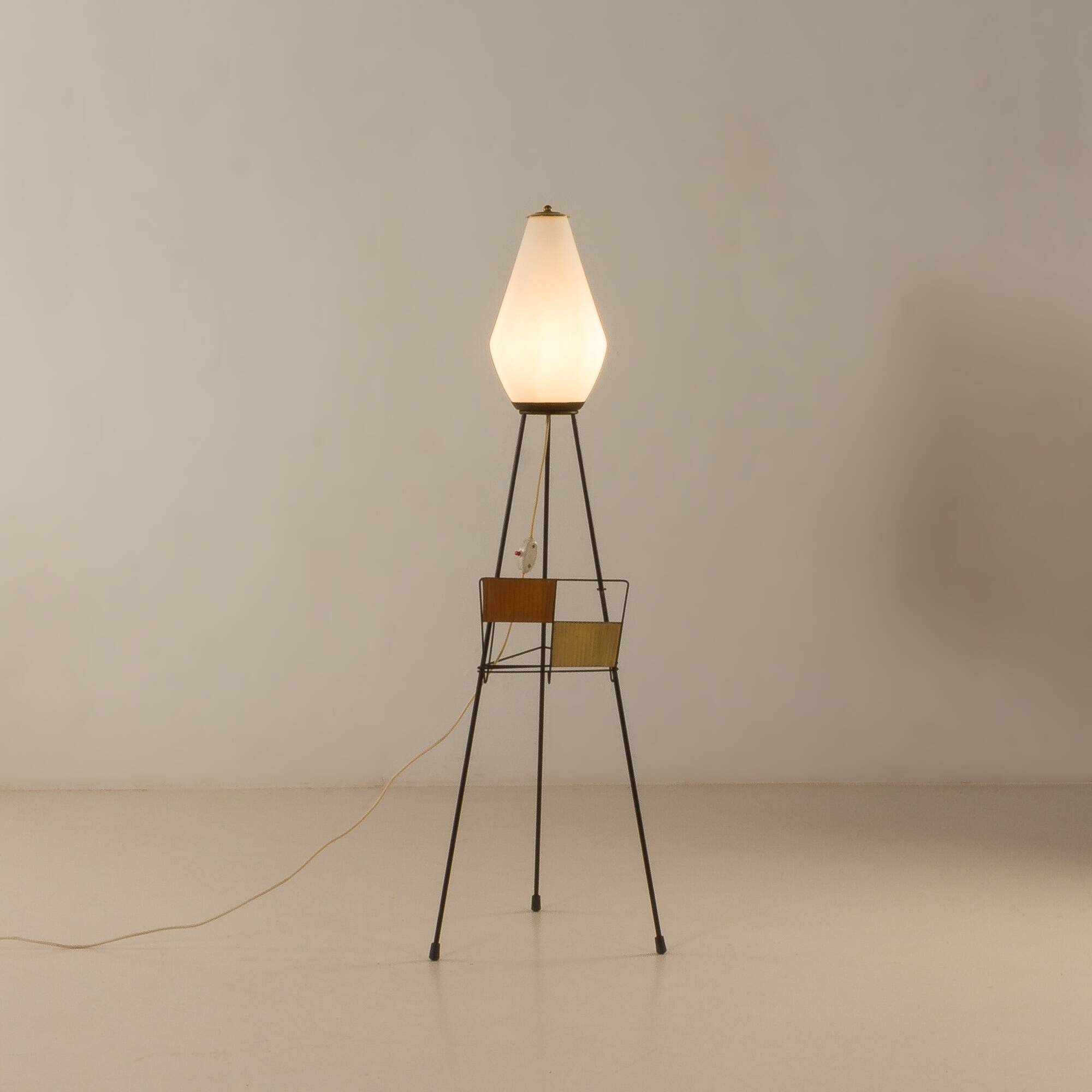 Italian mid-century floor lamp with a newspaper rack in Stilnovo style, 1960s