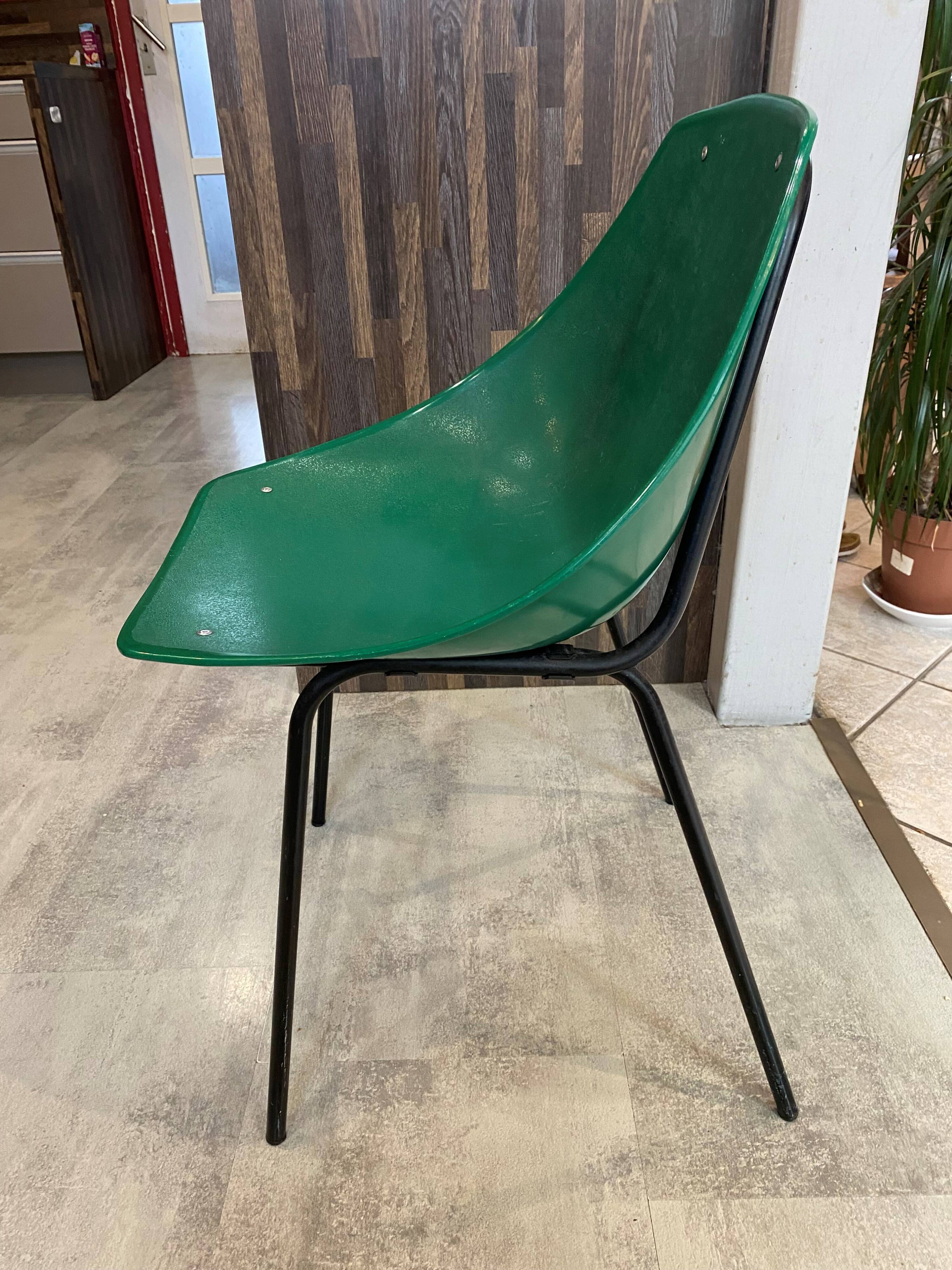 A shell chair by Pierre Guariche for Meurop in vintage green from the 1960s.