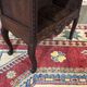Oak accent furniture bookshelf with a drawer, early 20th century work.