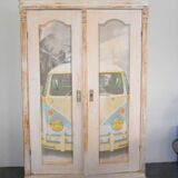 Vintage blonde wood wardrobe painted in antique white, doors decorated with Volkswagen Samba, unique piece.