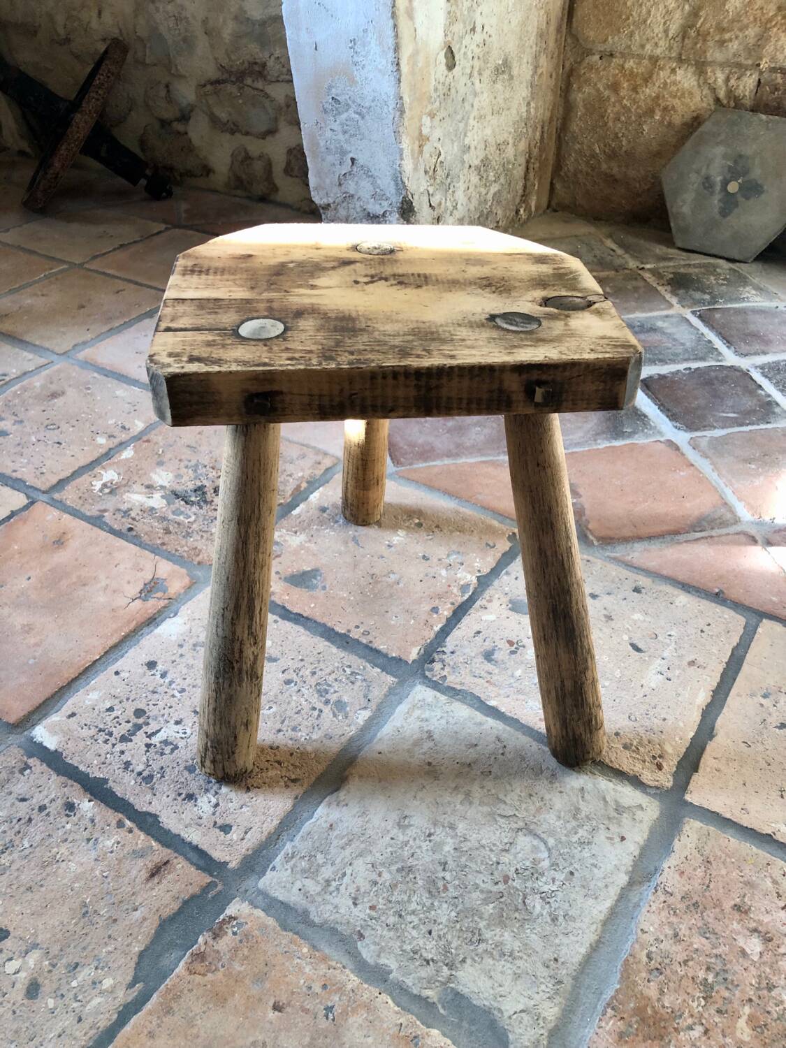 Renovated tripod farm stool