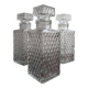 3 diamond-patterned chiseled glass carafes