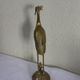 Heron in brass on the back of a turtle, press paper, vintage 1970