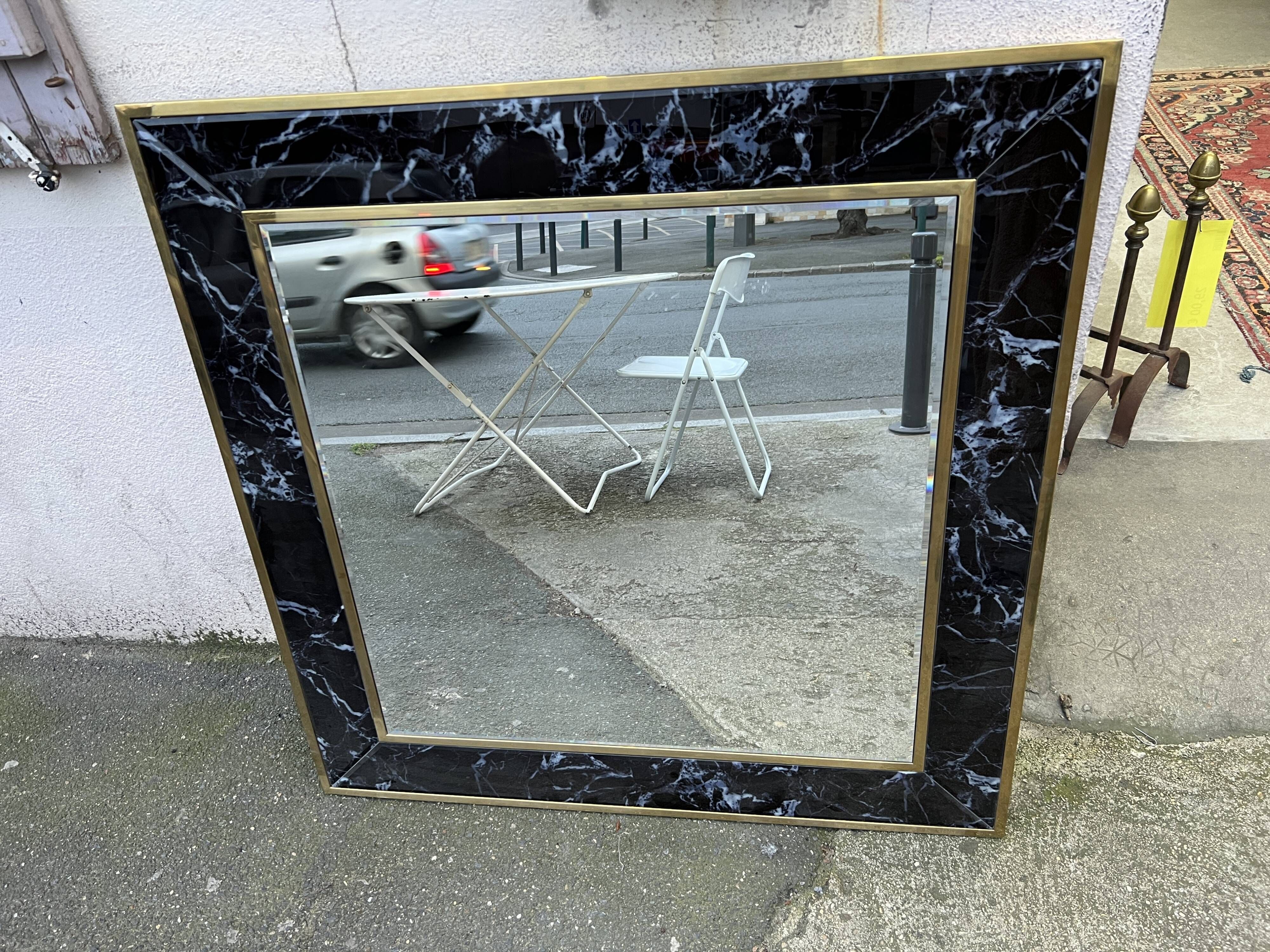 Mirror in brass and white veined black marble from the 70s