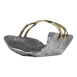 Firewood holder by David Marshall, 1980s