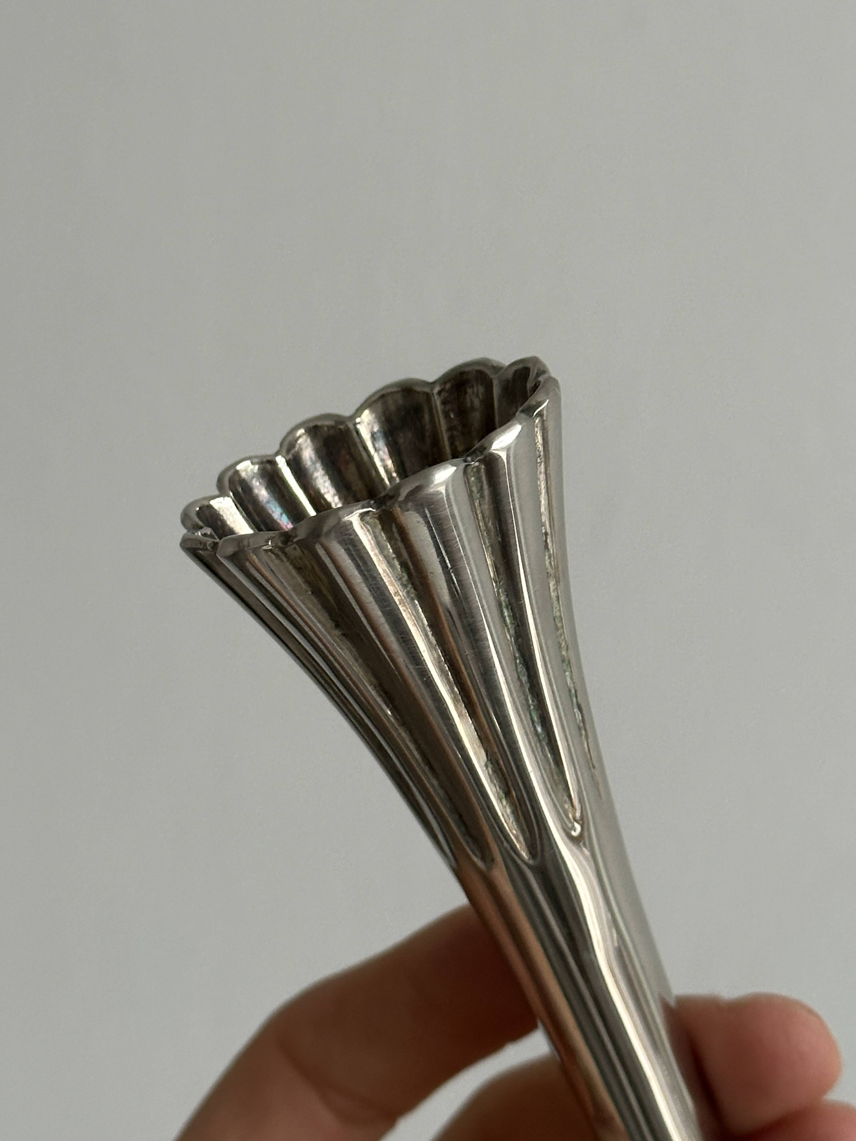 slender chrome metal candlestick