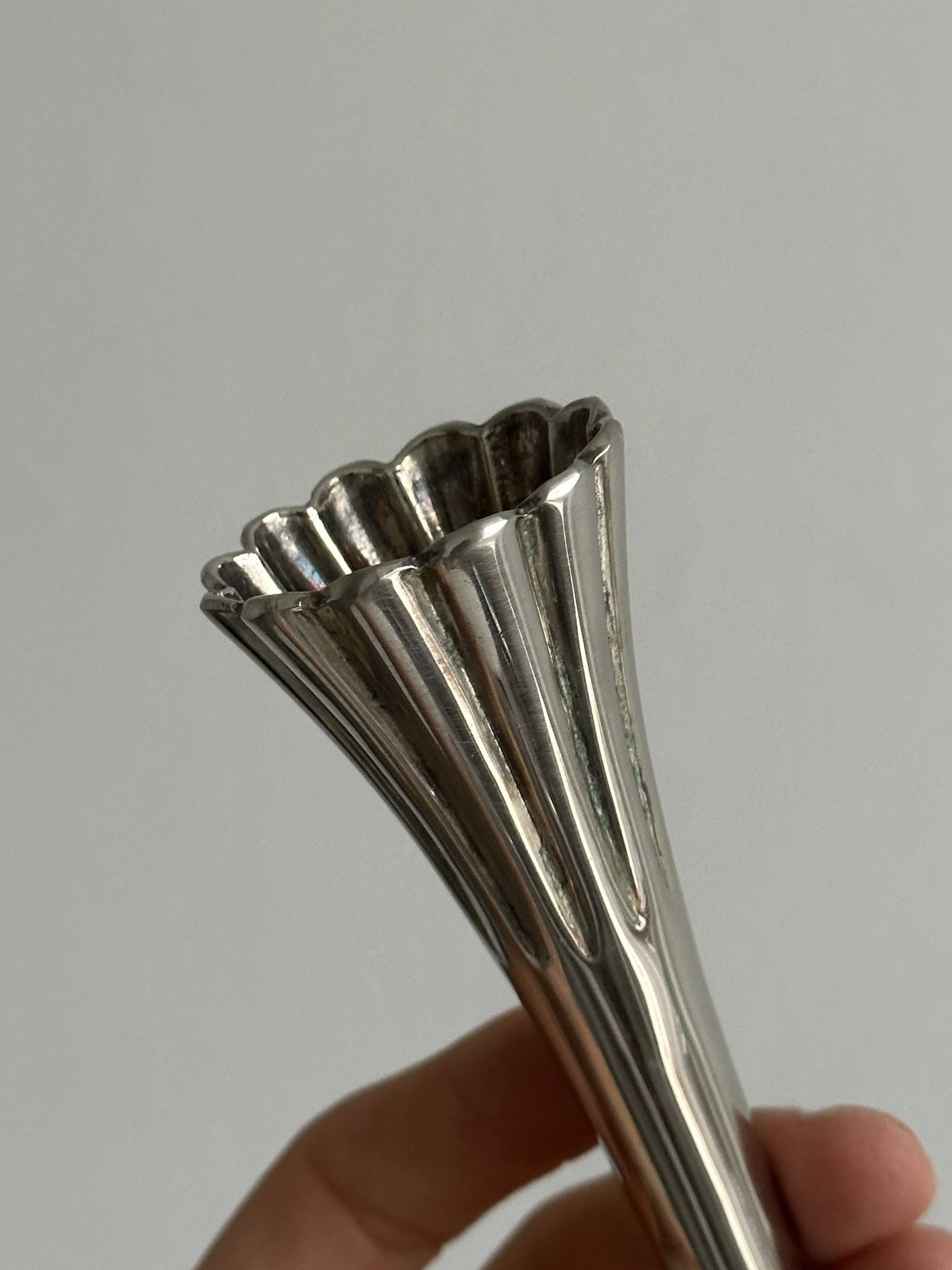 slender chrome metal candlestick