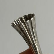 slender chrome metal candlestick