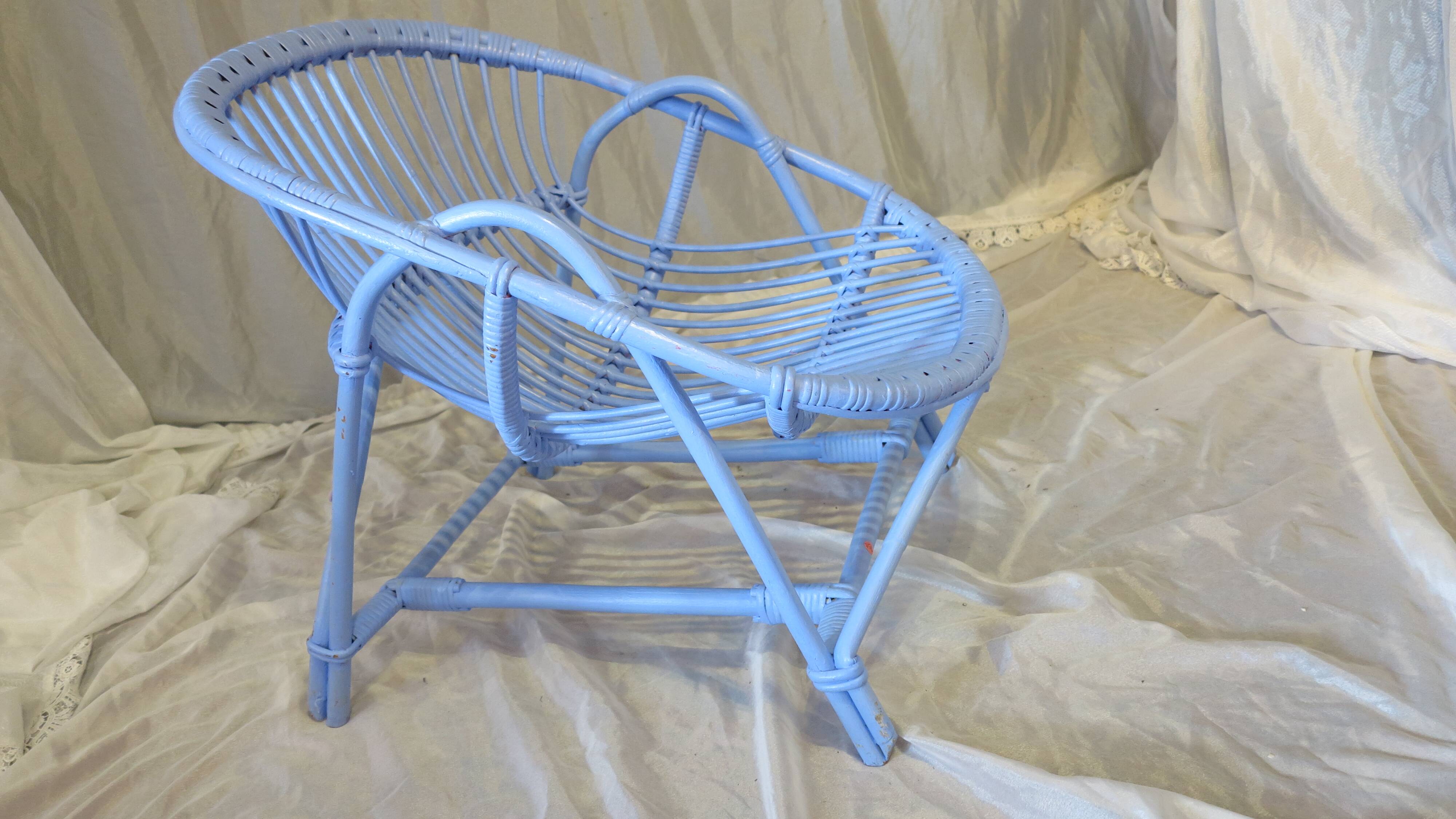 Blue painted rattan armchair