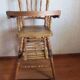 Chaise haute d'enfant , en bois , début 20ème