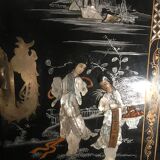 Asian lacquer cabinet with mother-of-pearl relief pattern