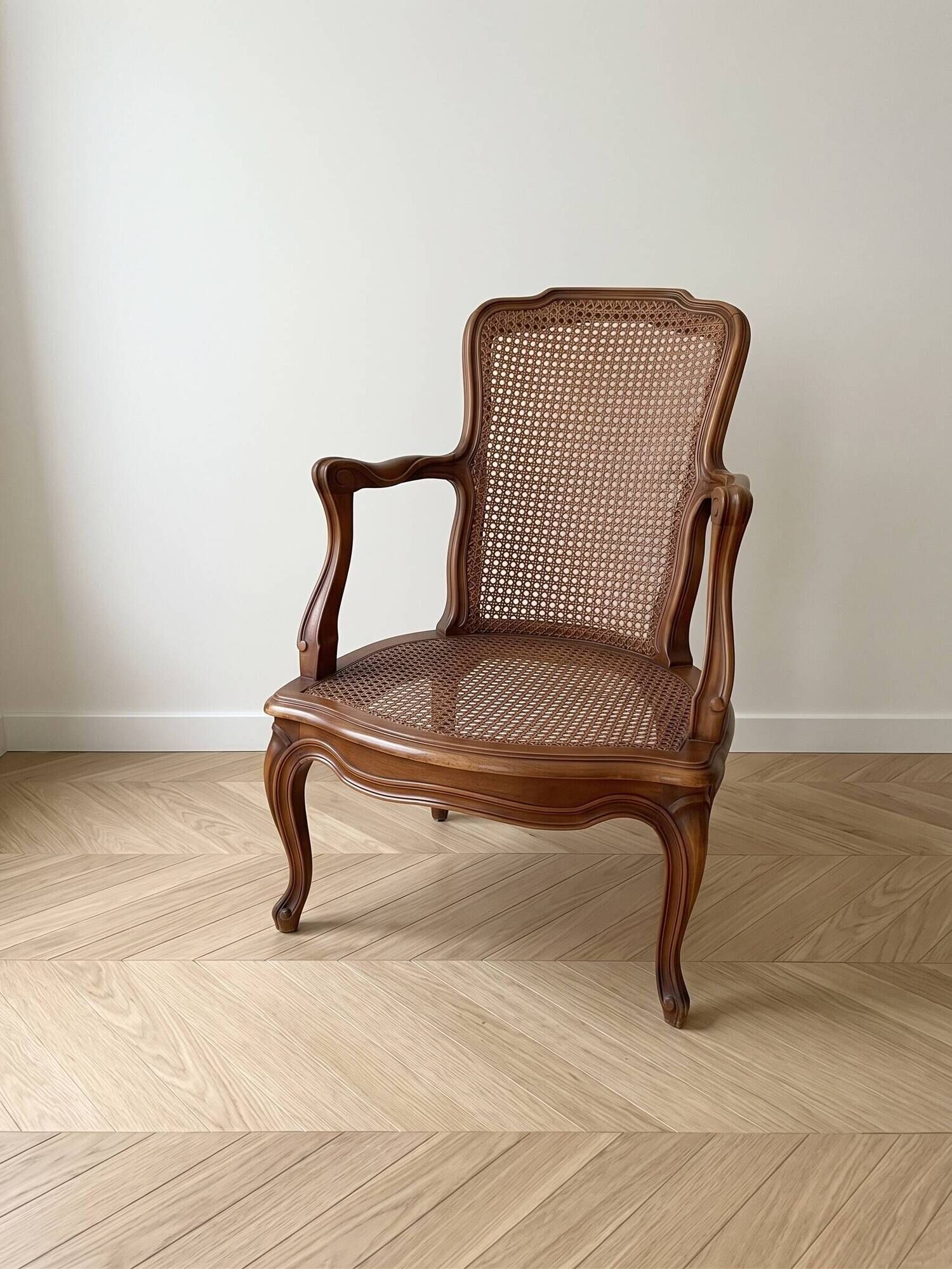 Low Louis XV armchair in wood and cane