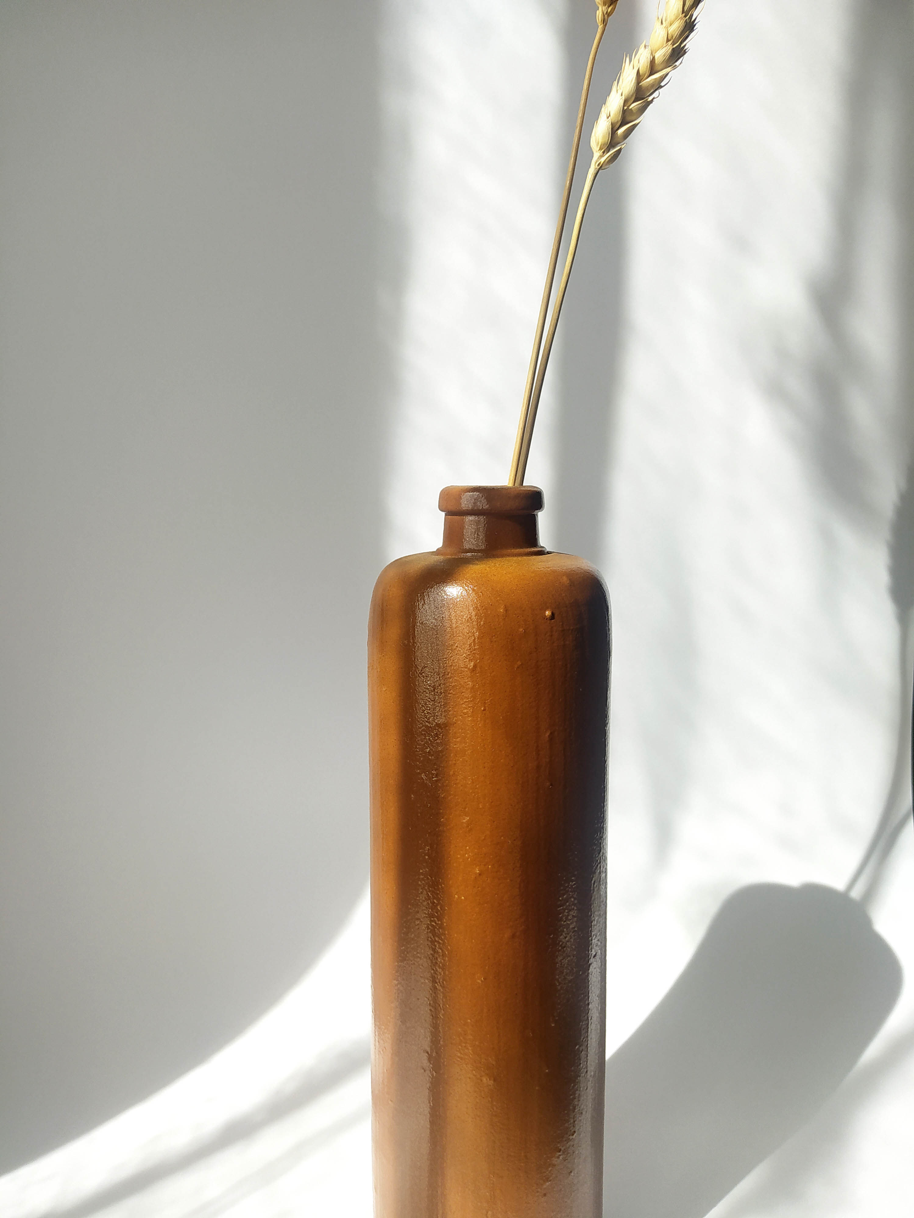 Vintage brown stoneware bottle