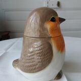 Covered jar jar jar in the shape of a bird