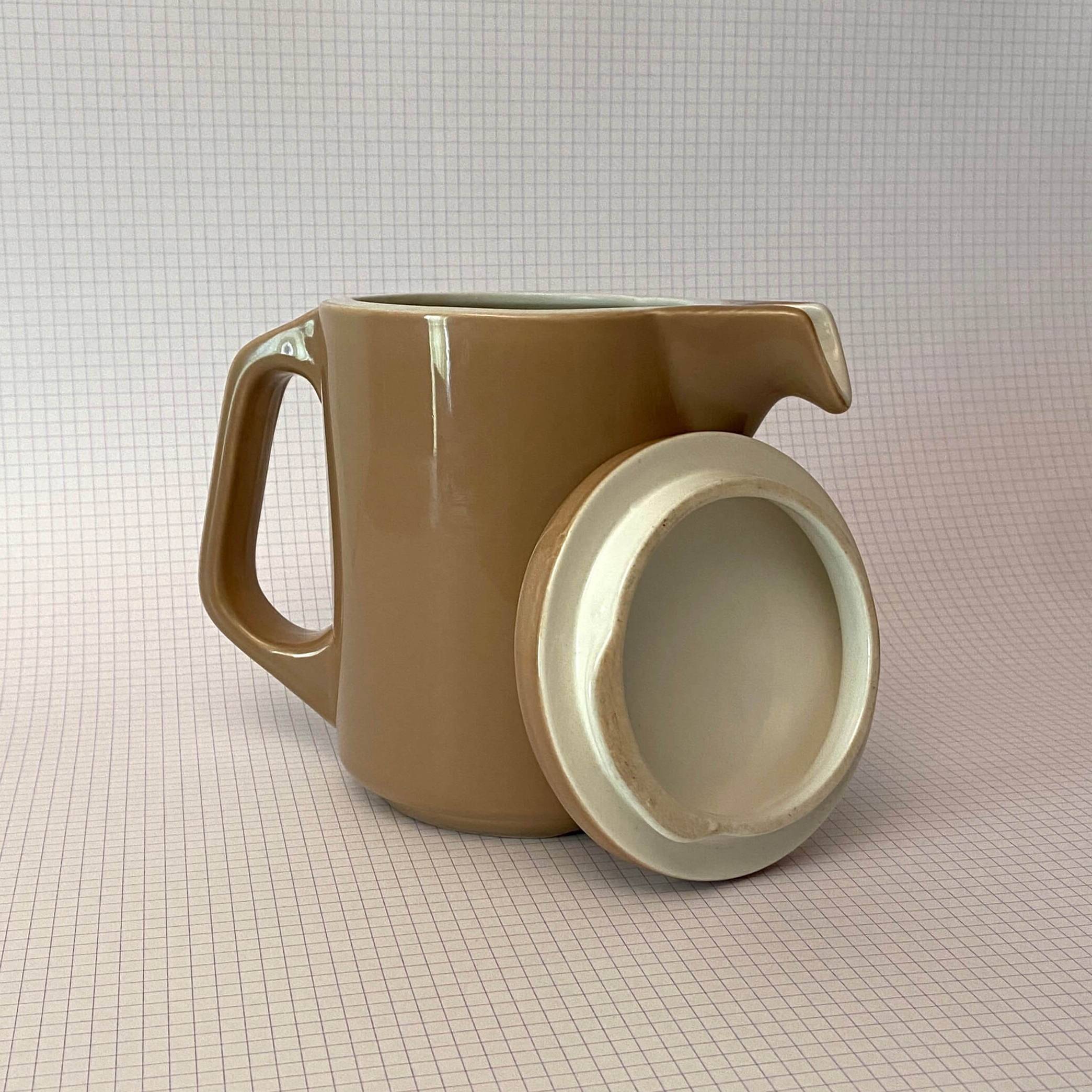 Brown ceramic pitcher