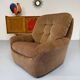 Old vintage 60s fabric lounge chair
