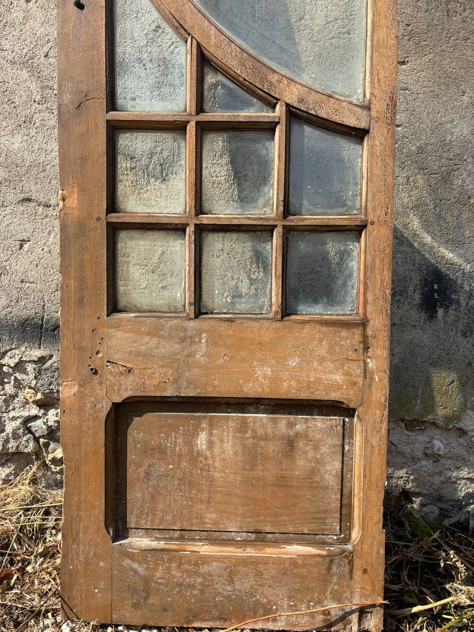 Single oak door with glass in the 19th/20th century