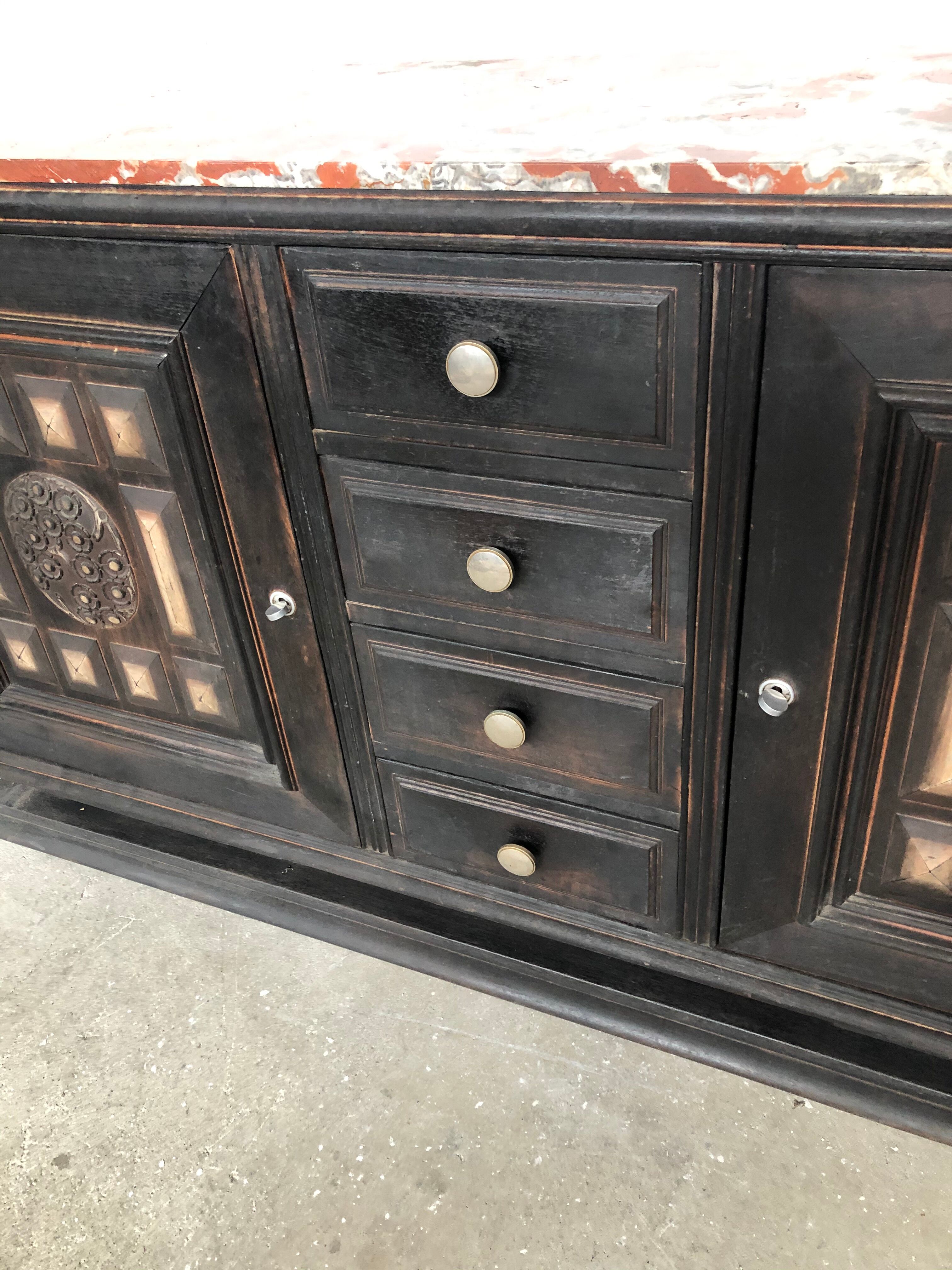 Blackened wooden sideboard of the 1950s