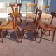 Set of 18 mismatched wooden bistro chairs - vintage