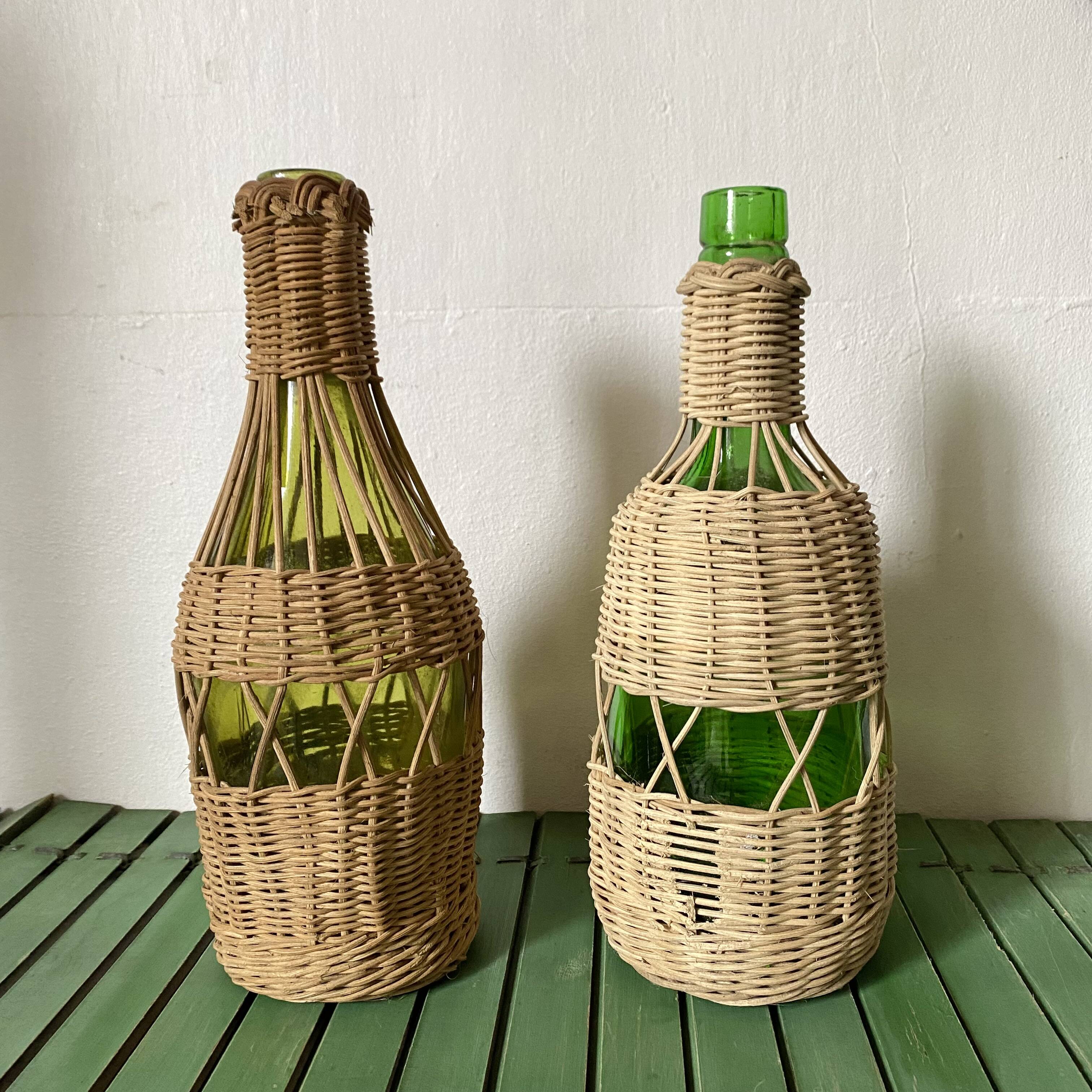 Glass bottles and woven rattan