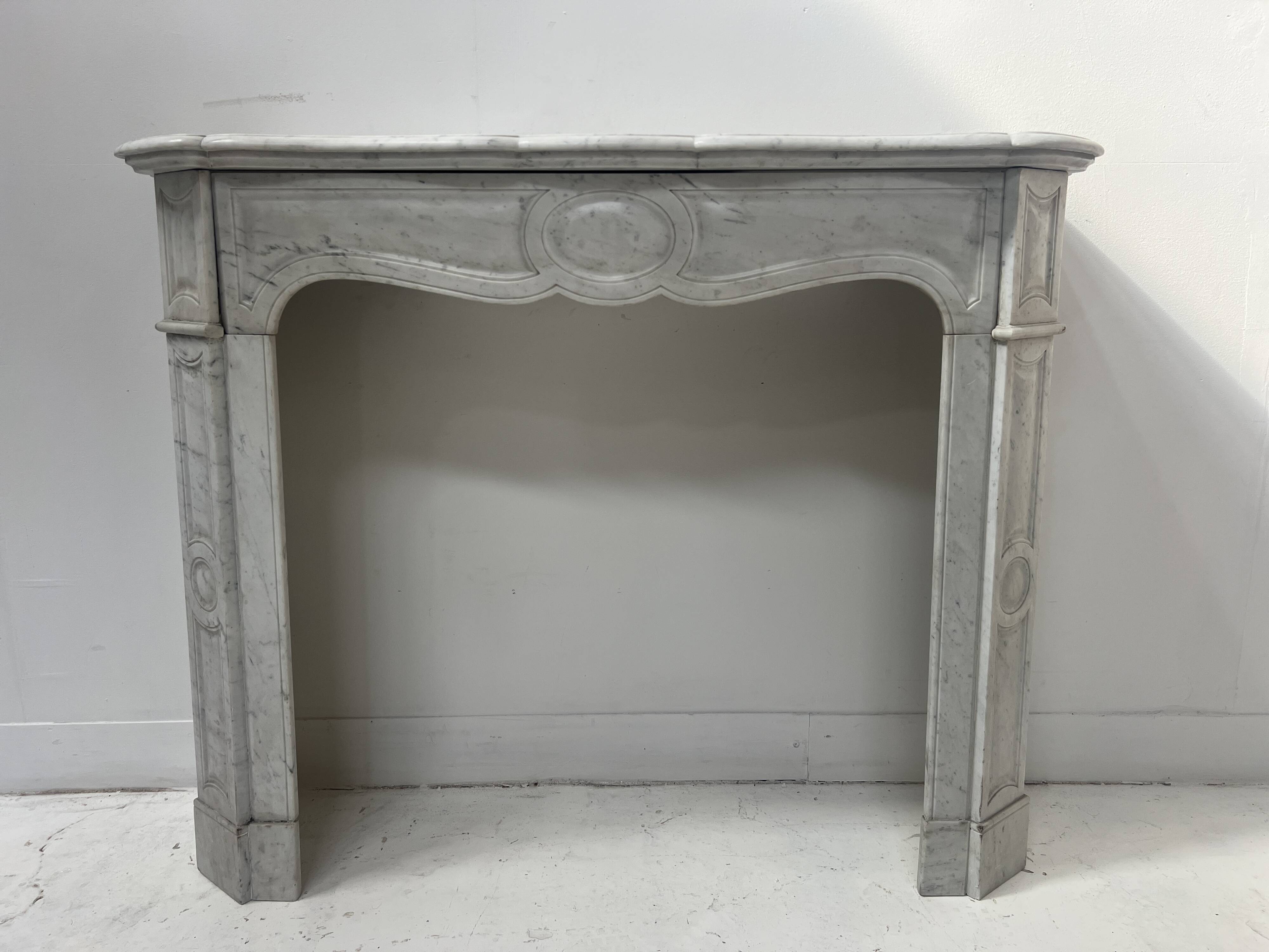 Louis XV style fireplace Model Pompadour White Carrara marble 20th century