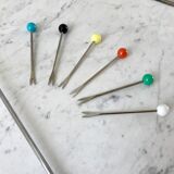 Set of seafood cutlery (ladle and 6 peaks) colorful 60s