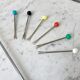 Set of seafood cutlery (ladle and 6 peaks) colorful 60s