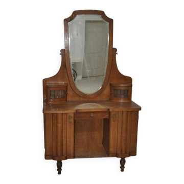 Grande coiffeuse vintage en bois marron avec miroir ovale et rangements intégrés