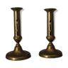 Pair of brass pusher candlesticks
