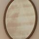 Gold oval mirror - mercury glass