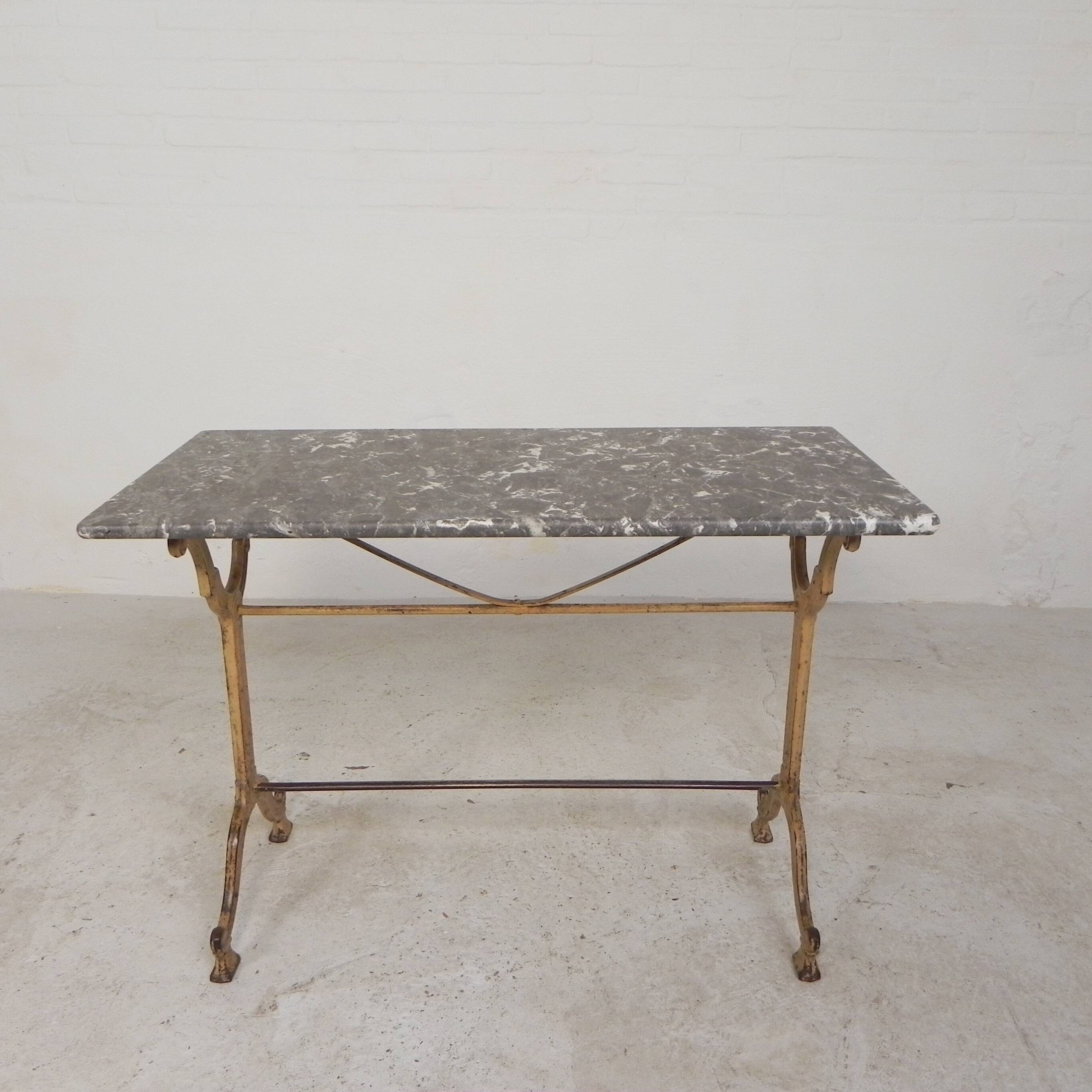 Bistro table marked A.Delail Toulouse in cast iron and marble, 1920