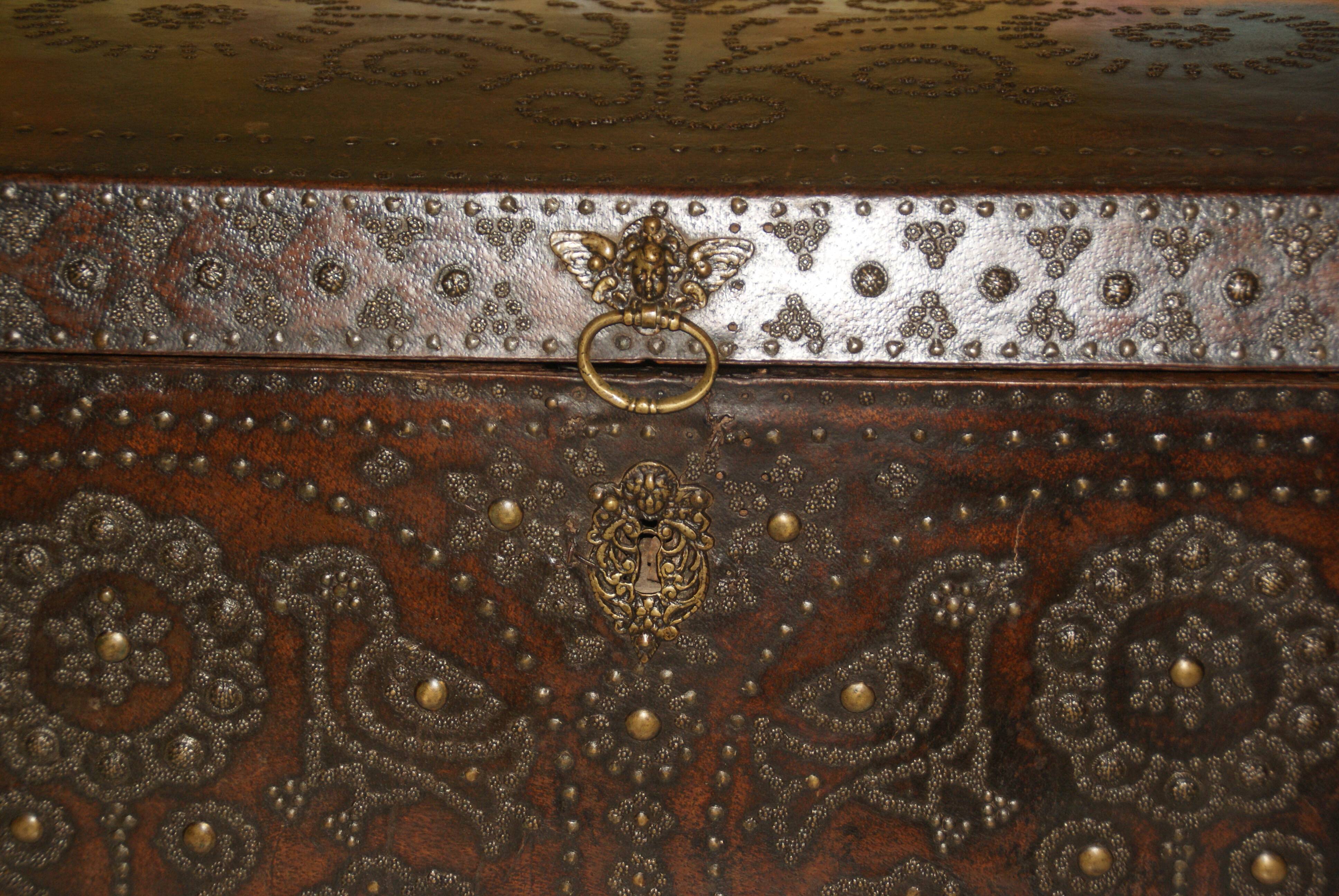 17th century studded leather travel trunk, richly decorated