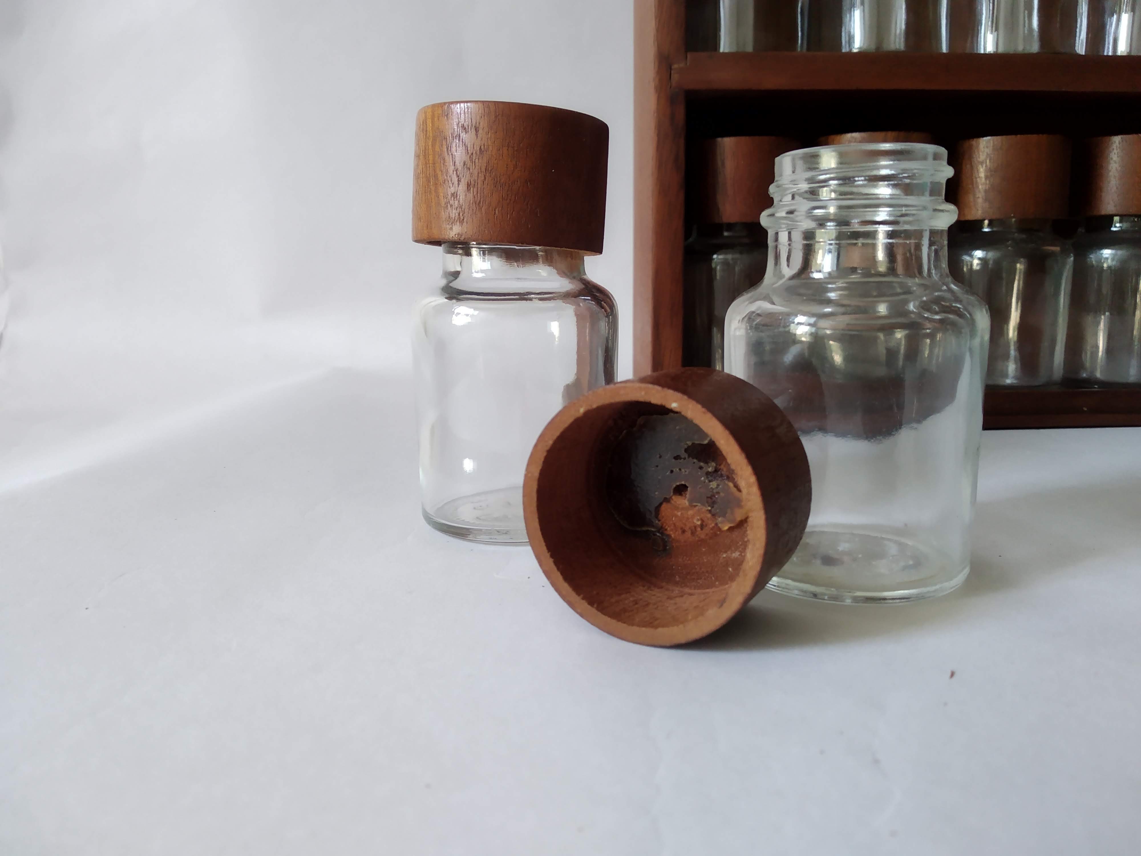 Wooden shelf with 32 vintage Cole & Mason spice jars