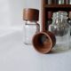 Wooden shelf with 32 vintage Cole & Mason spice jars