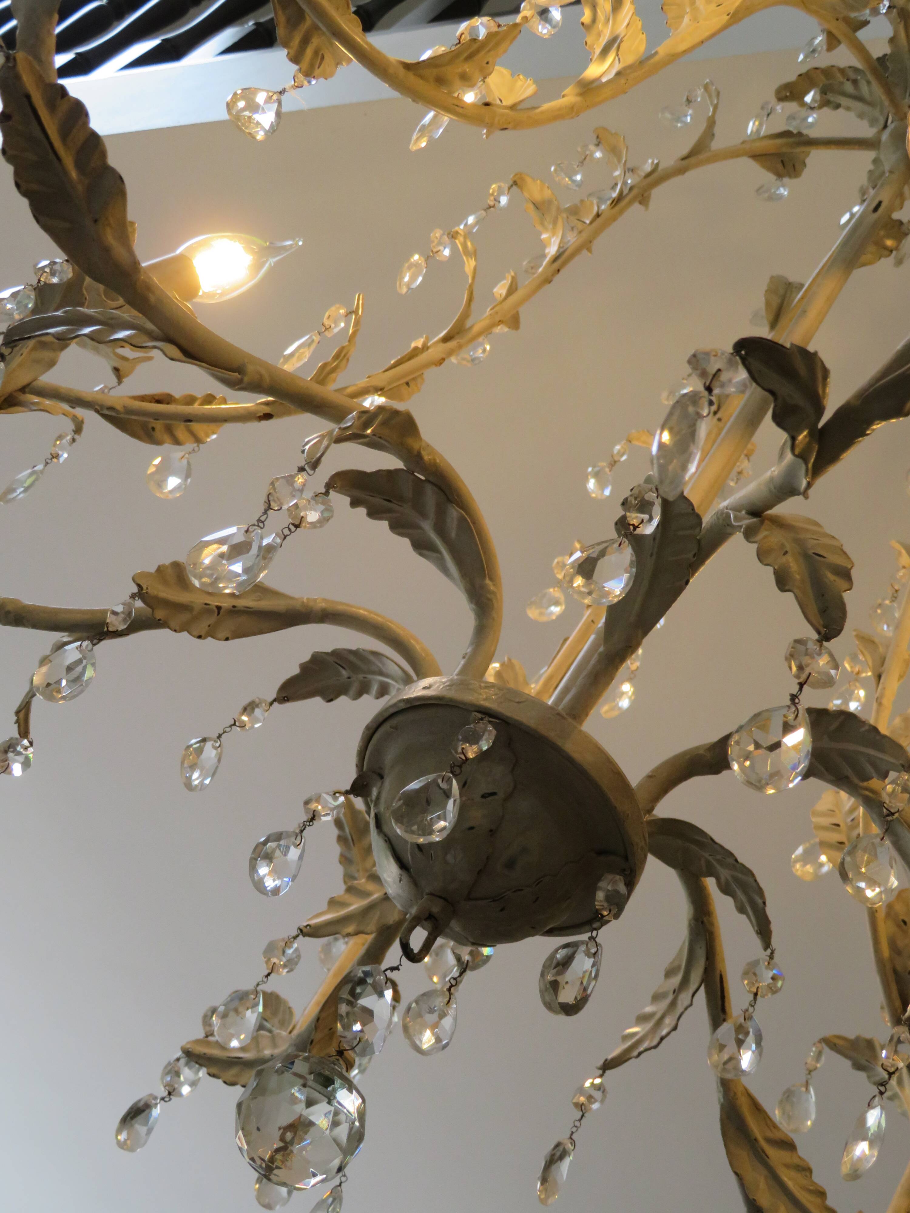 Large cage chandelier in aged metal.