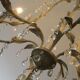 Large cage chandelier in aged metal.