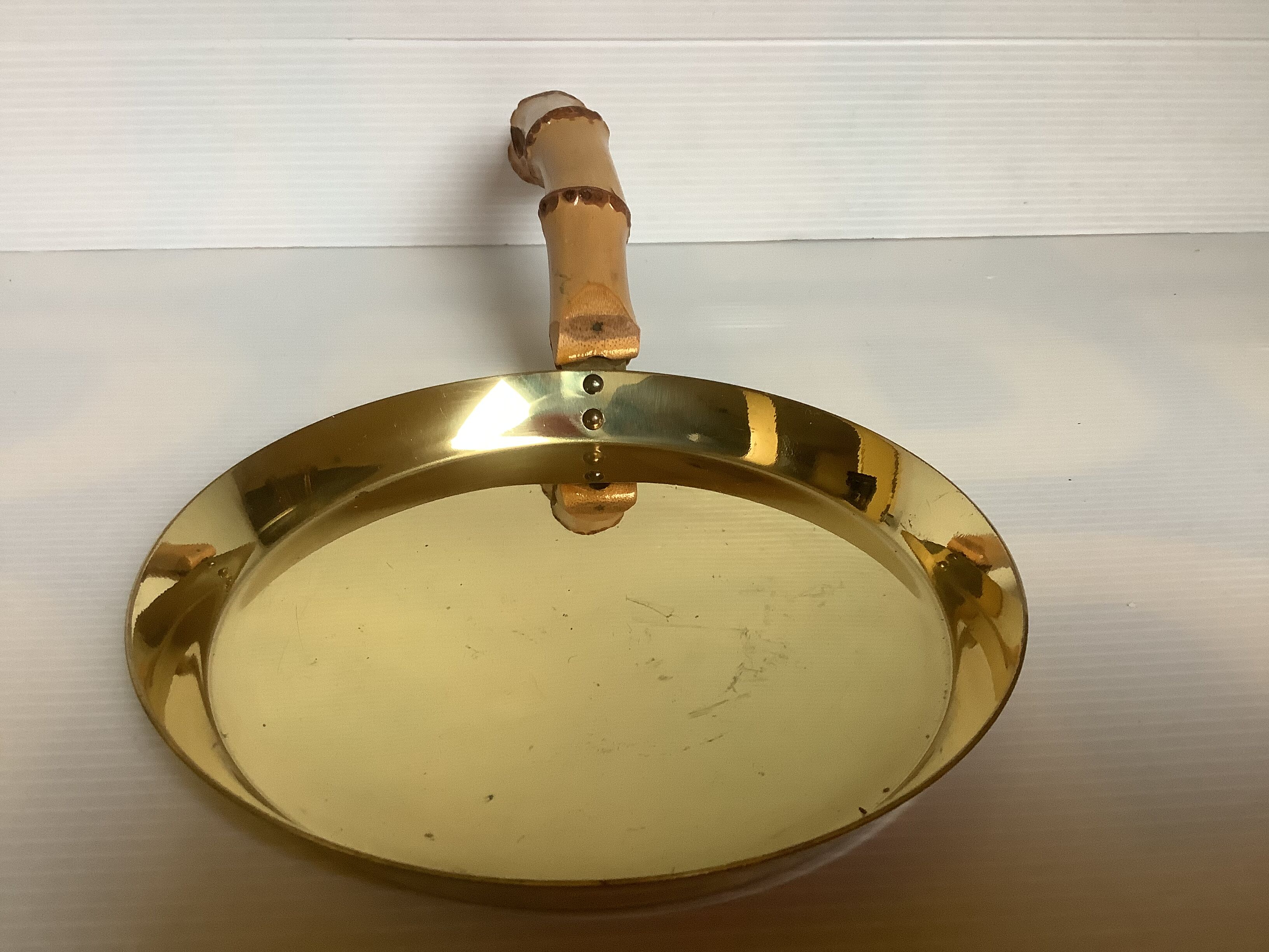 Grasoli Germany bamboo brass pocket emptier