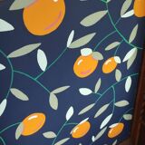 Caned cabinet with oranges