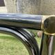 Vintage rectangular wall mirror in tubular metal and brass, 1970s/1980s.
