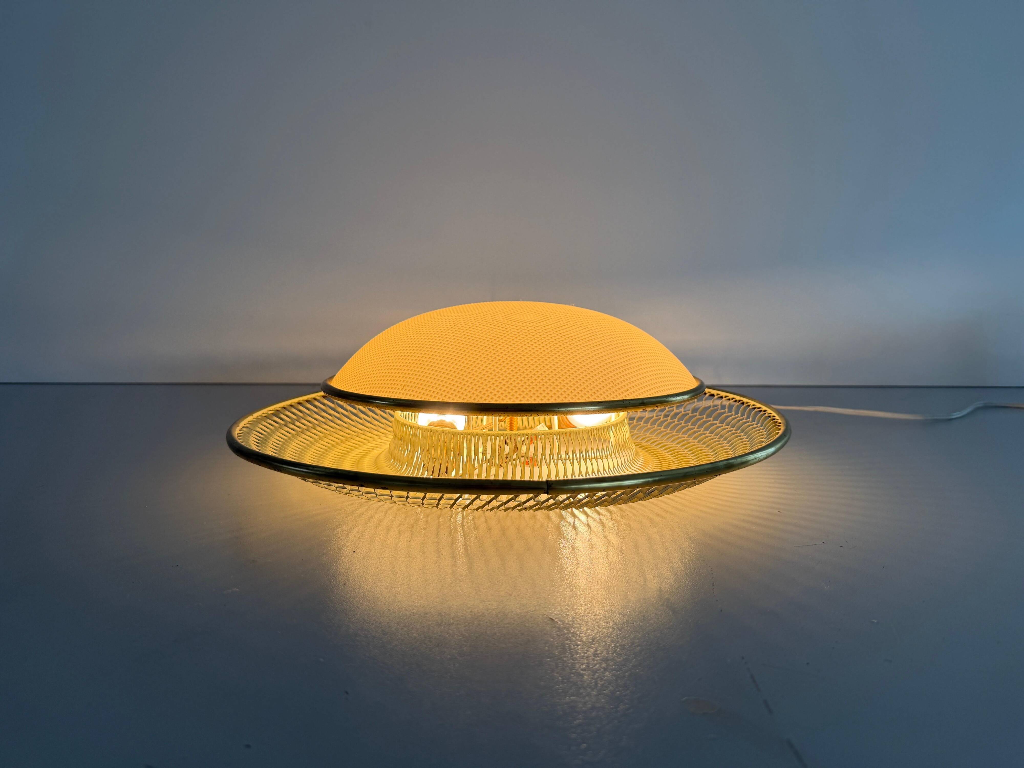 Mid-century golden metal wire and plastic ceiling light by Erco, 1950s, Germany.