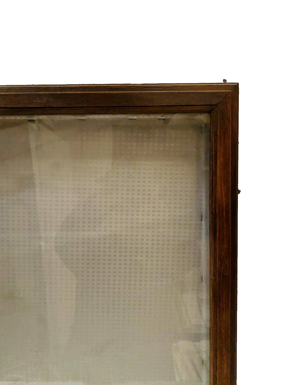 Wall display case with a solid oak door